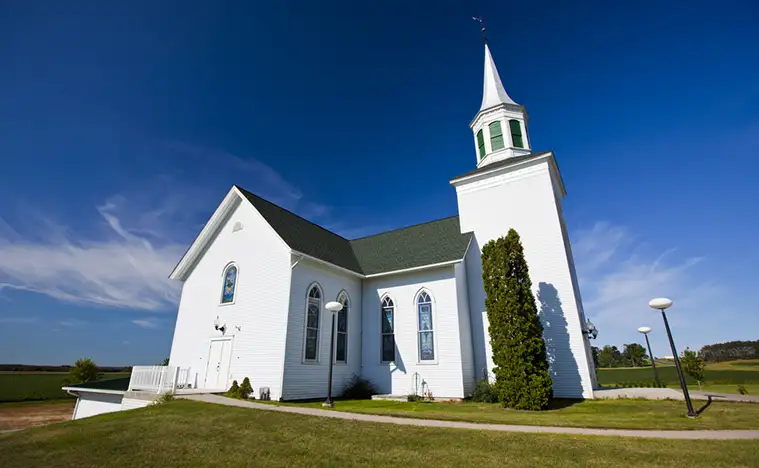 Traditional American white church in the countryside