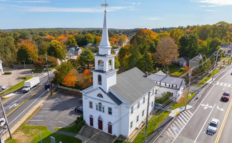 First Baptist Church aerial view in fall on Main Street in historic town center